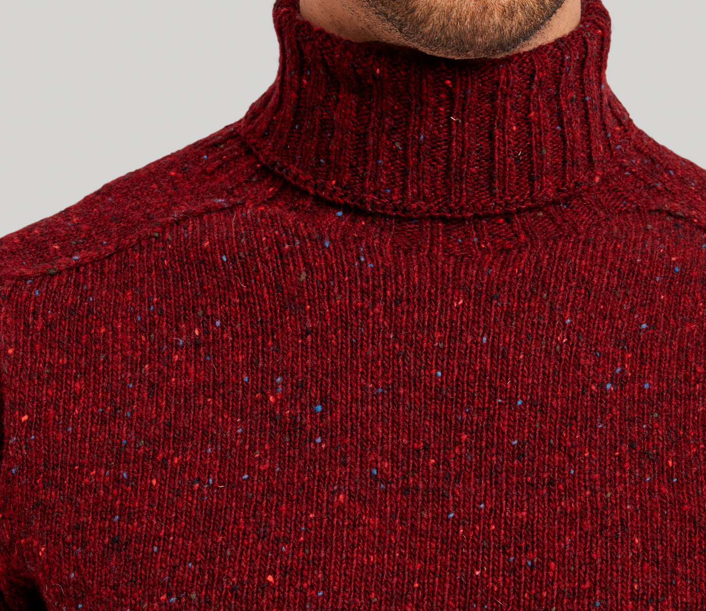 Merino Wool Donegal Roll Neck Jumper in Burgundy Tweed