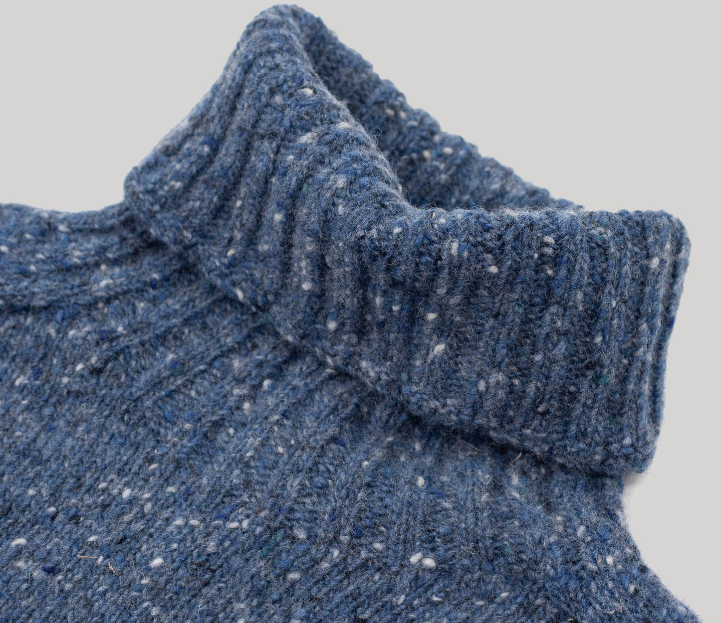 Merino Wool Donegal Roll Neck Jumper in Storm Tweed