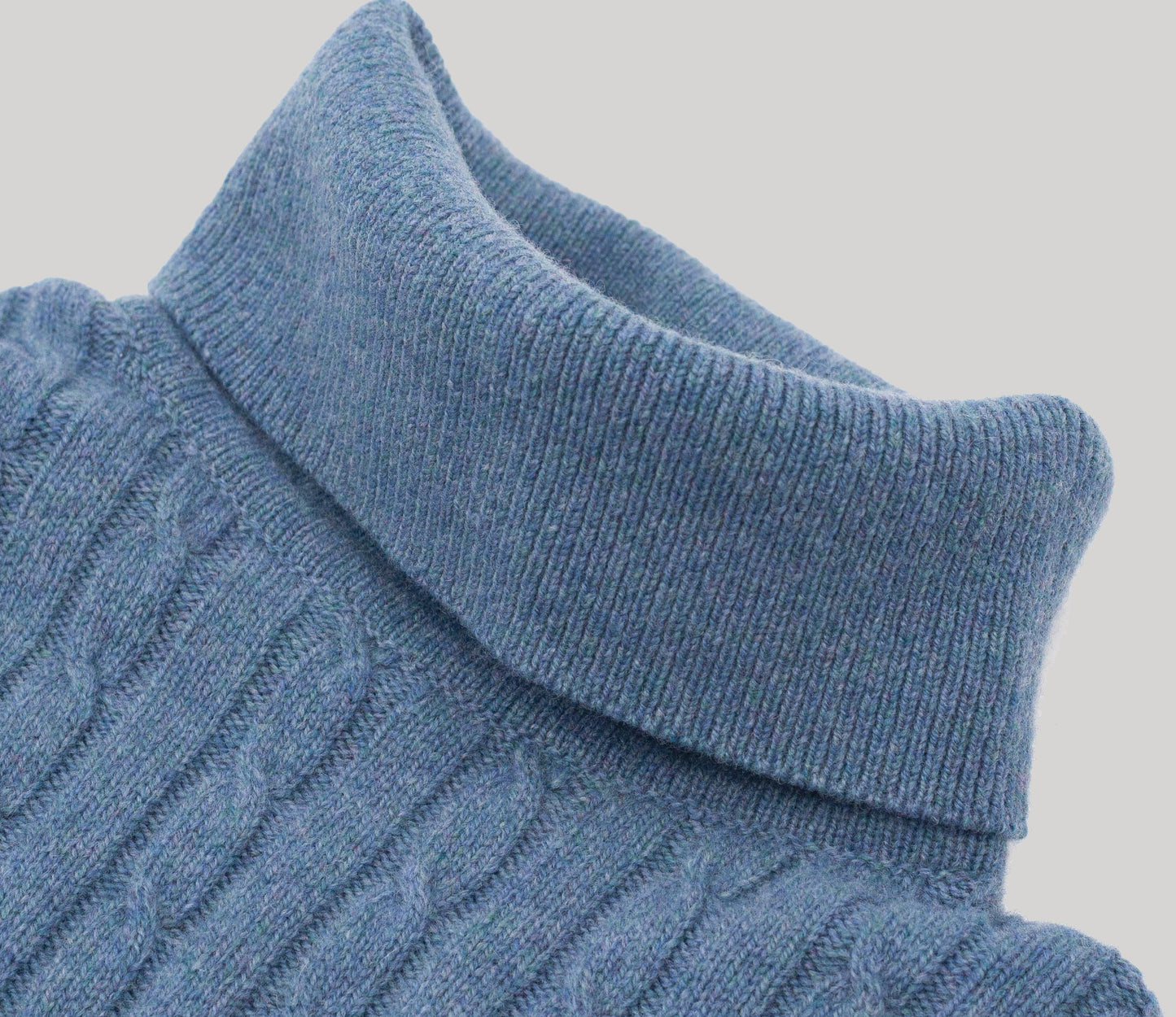 Geelong Lambswool Cable Roll Neck Jumper in Sky Blue