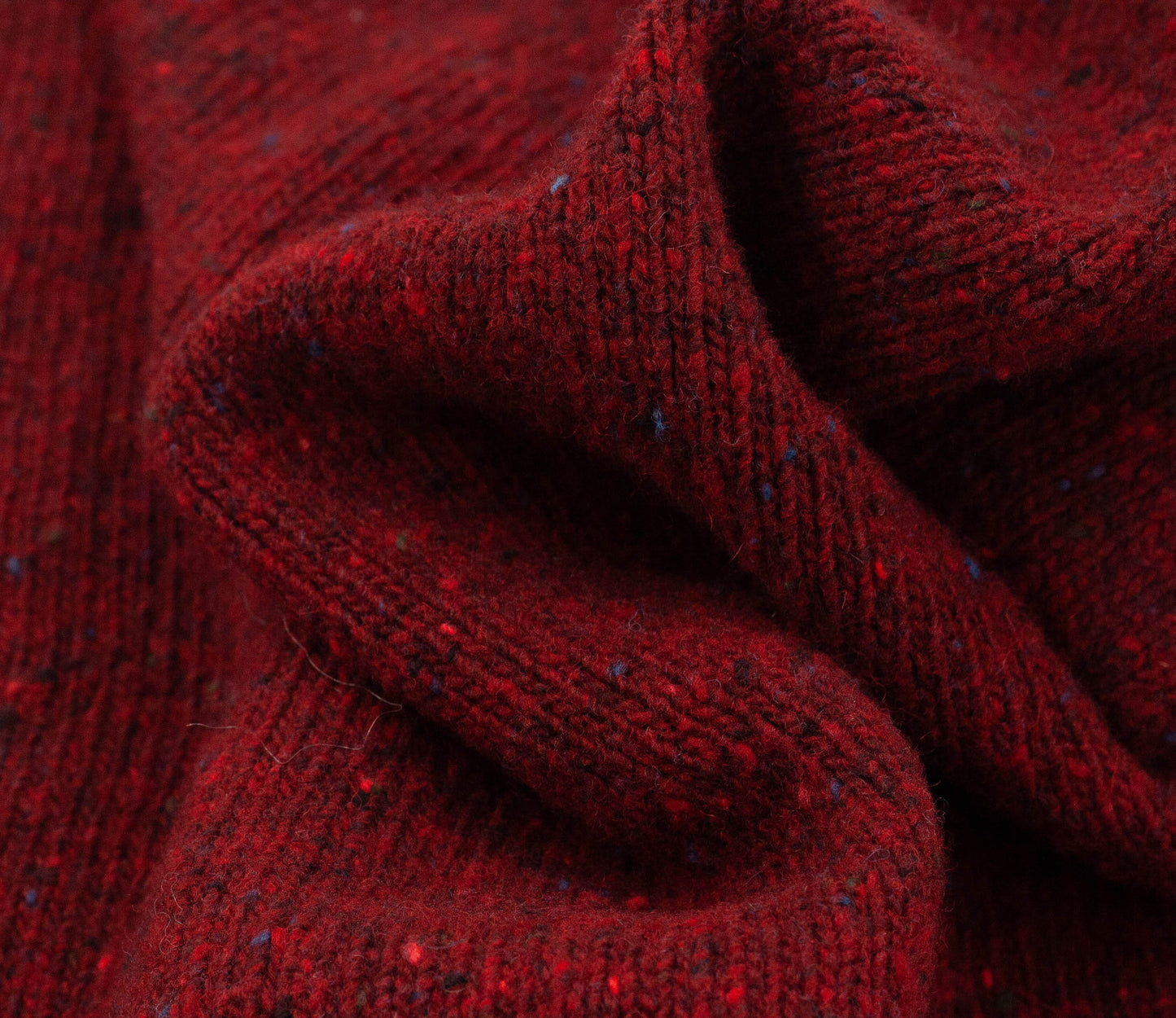 Merino Wool Donegal Roll Neck Jumper in Burgundy Tweed