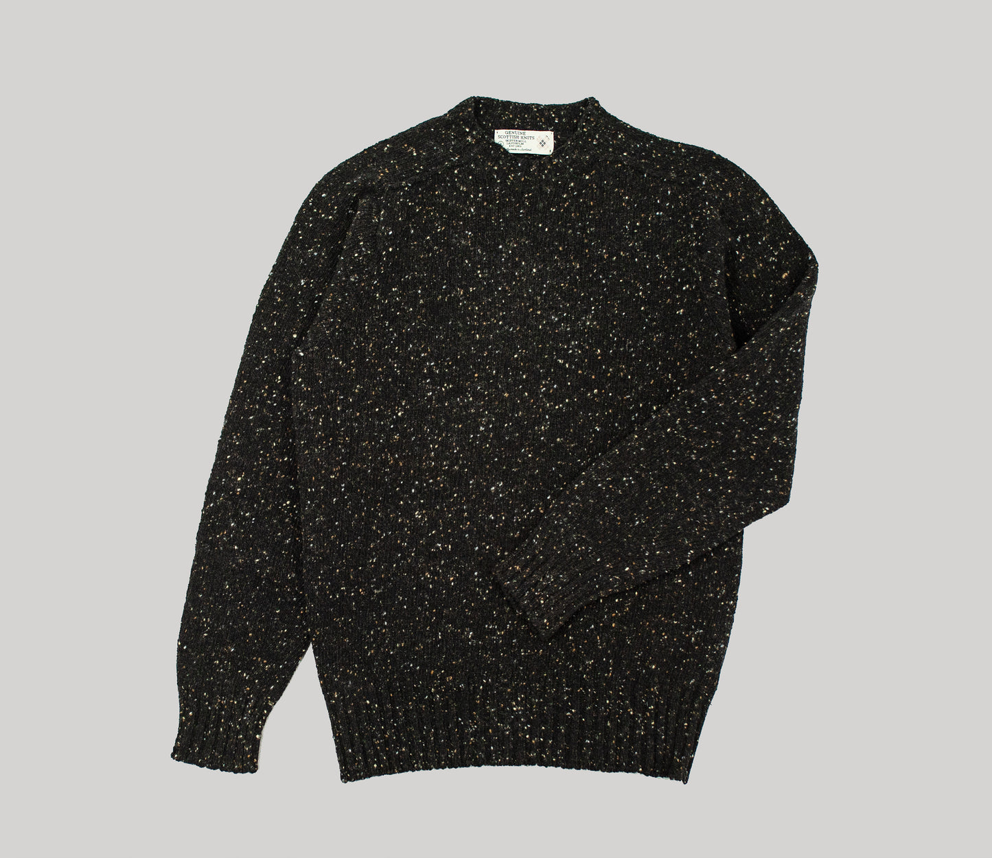 Merino Wool Donegal Crew Neck Jumper in Black Tweed